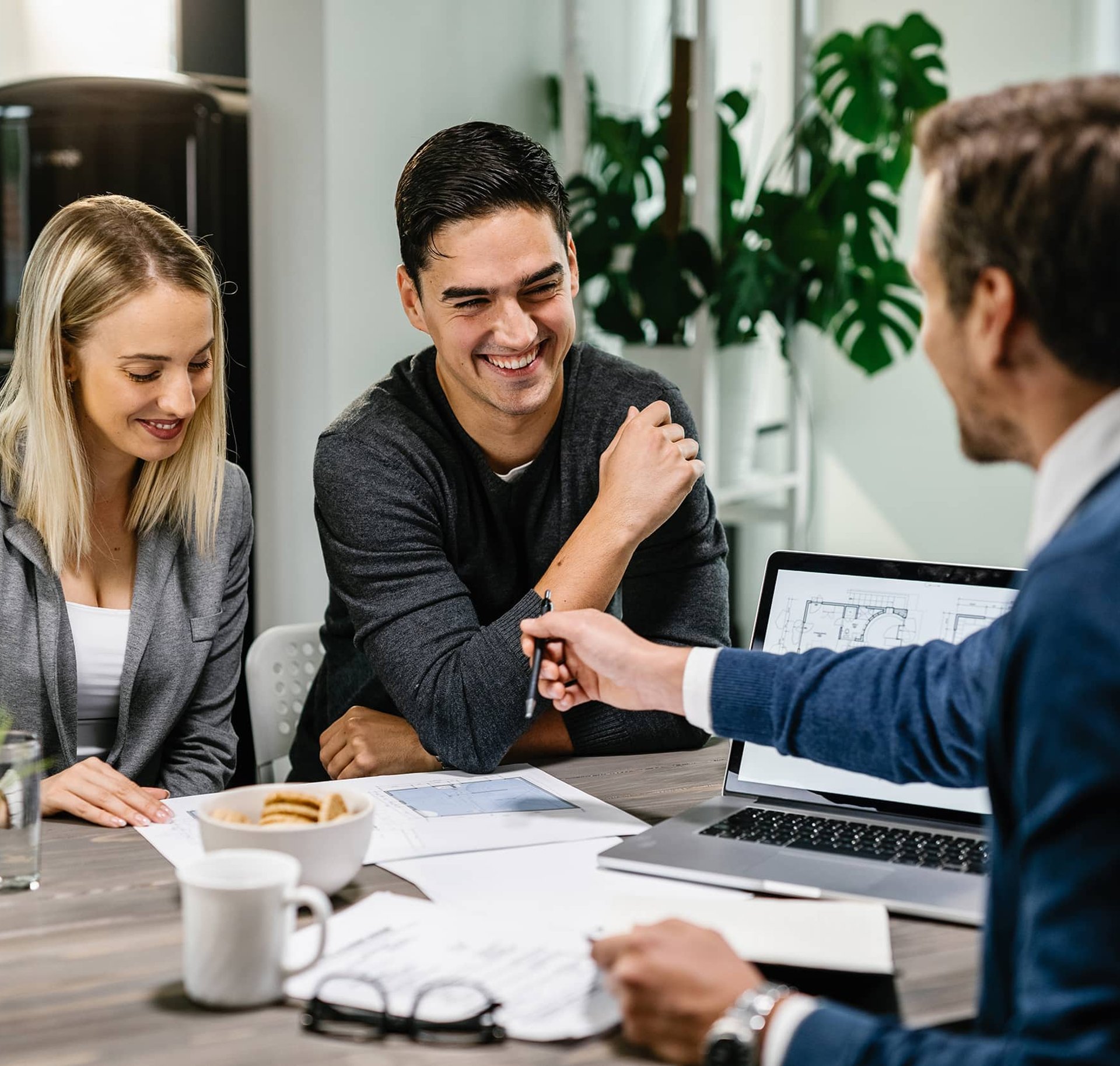 Mortgage broker meeting with clients in Western Sydney