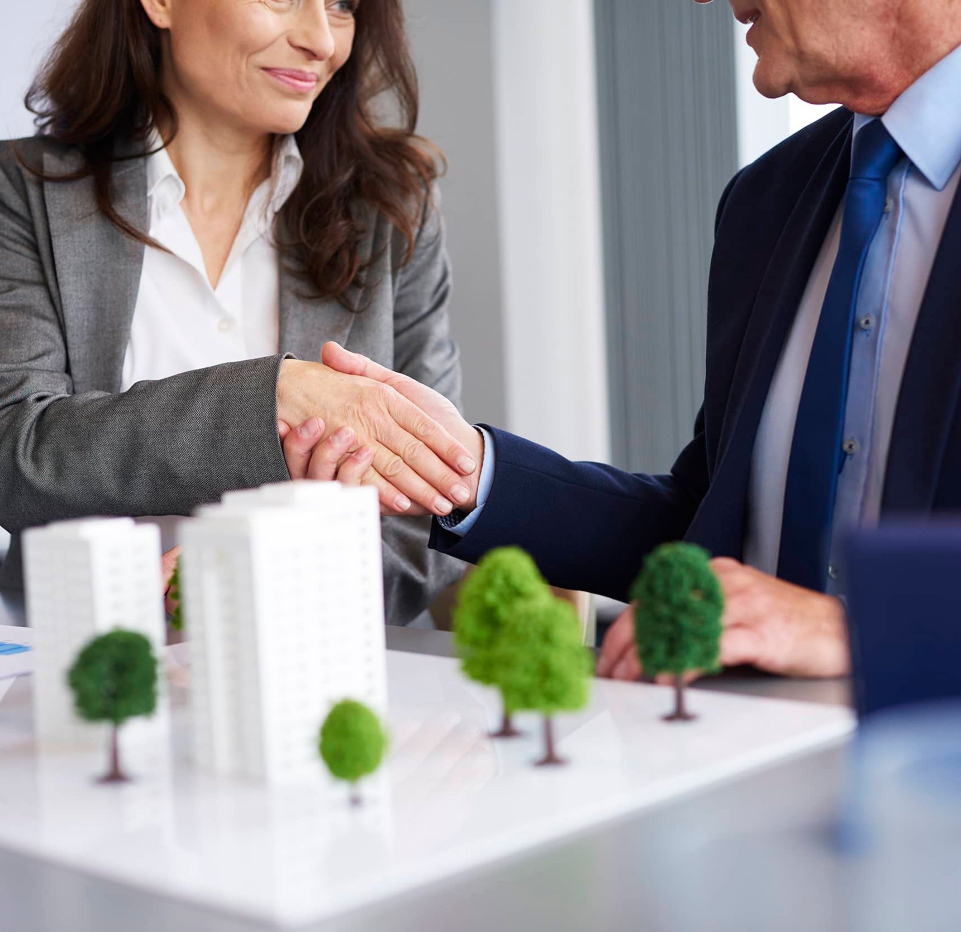 Experienced mortgage broker reviewing loan options with a client